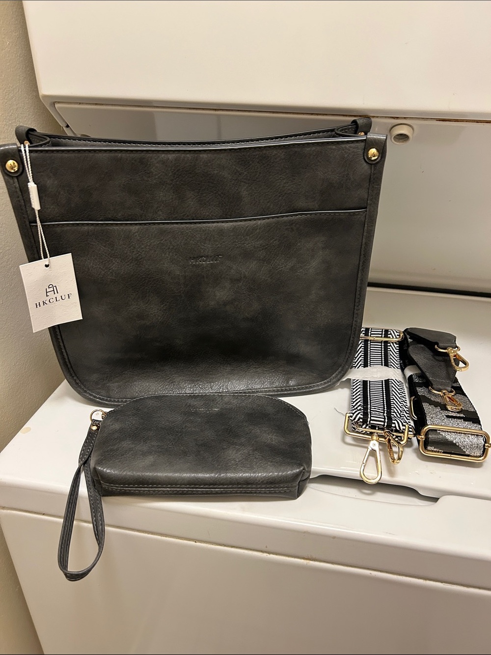 Woman’s Gray Crossbody Bag comes with a Wristlet Pouch